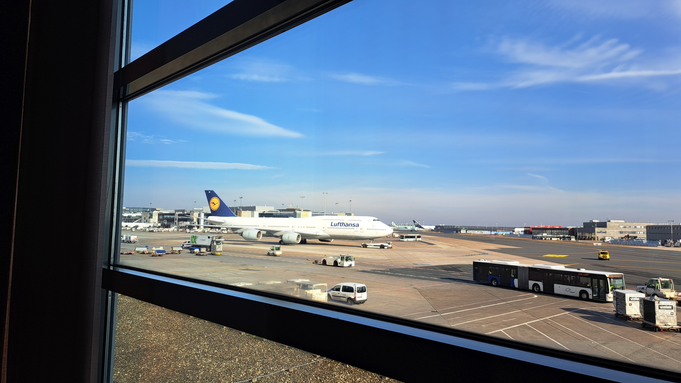 Air Canada Maple Leaf Lounge Frankfurt — lounge interior with warm wood accents and soft lighting